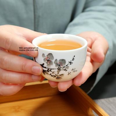 BỘ ẤM CHÉN HOA ĐÀO VẼ THEO LỐI THƯ PHÁP